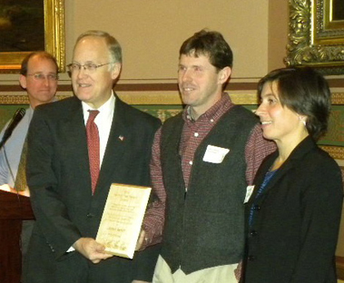 Jayson Former Governor Douglas presents Jason with award
